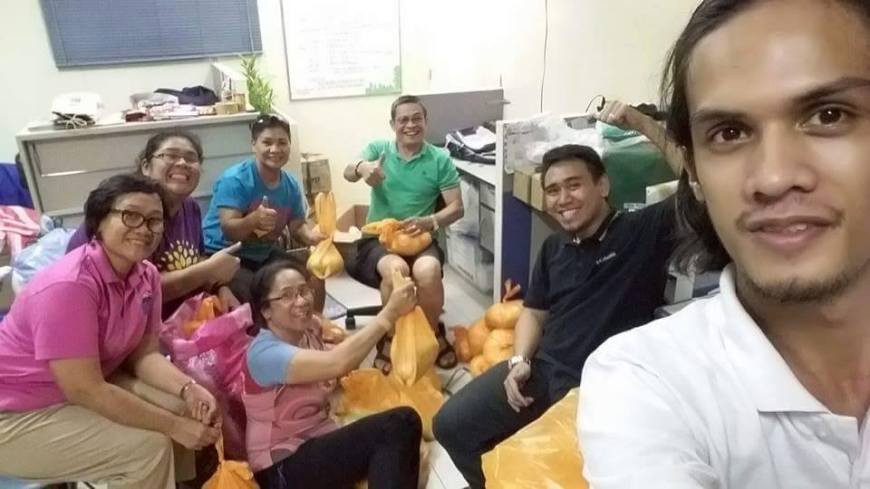 our workers packing the donations